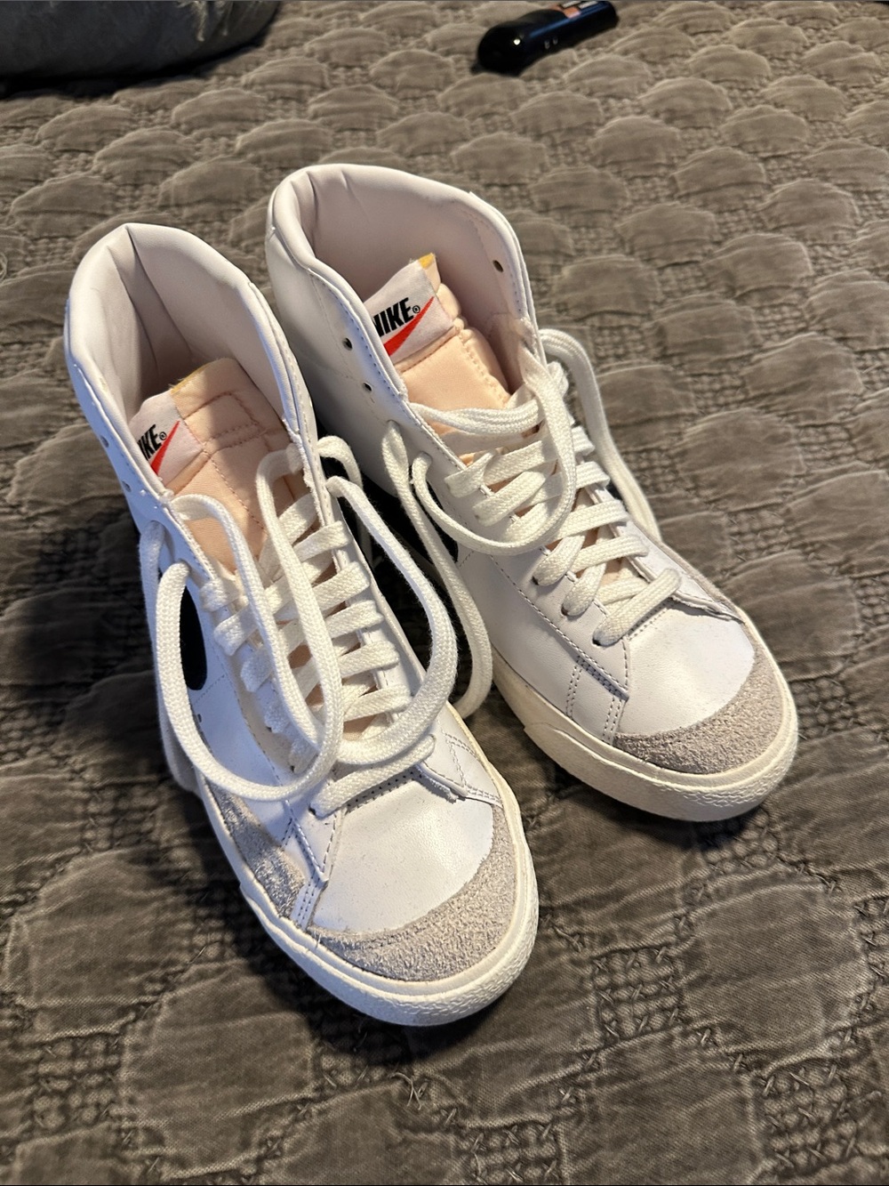 Nike Women’s White High-Top Sneakers with Black Swoosh and Pink Tongue Accents